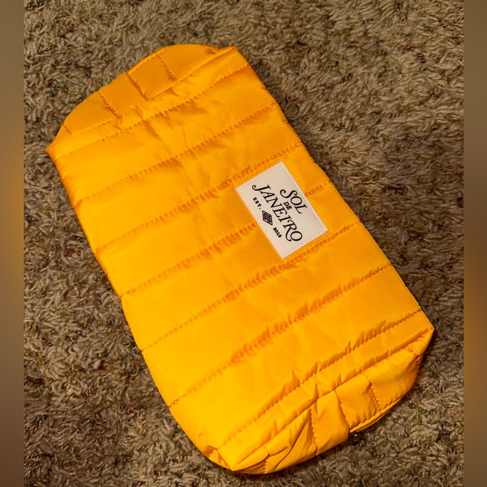 Sol de janeiro puffer bag purse clutch 💛